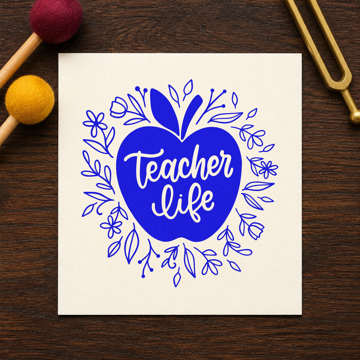 Teacher Life Floral Apple craft stamp imprinted in blue ink on paper, a design suited to preserve jar labels.