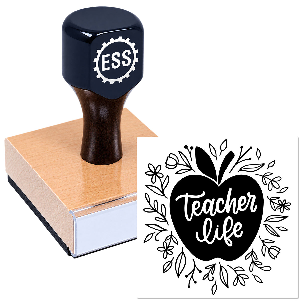 Black ESS rubber stamp and seal on a wooden block with white Teacher Life apple floral design.
