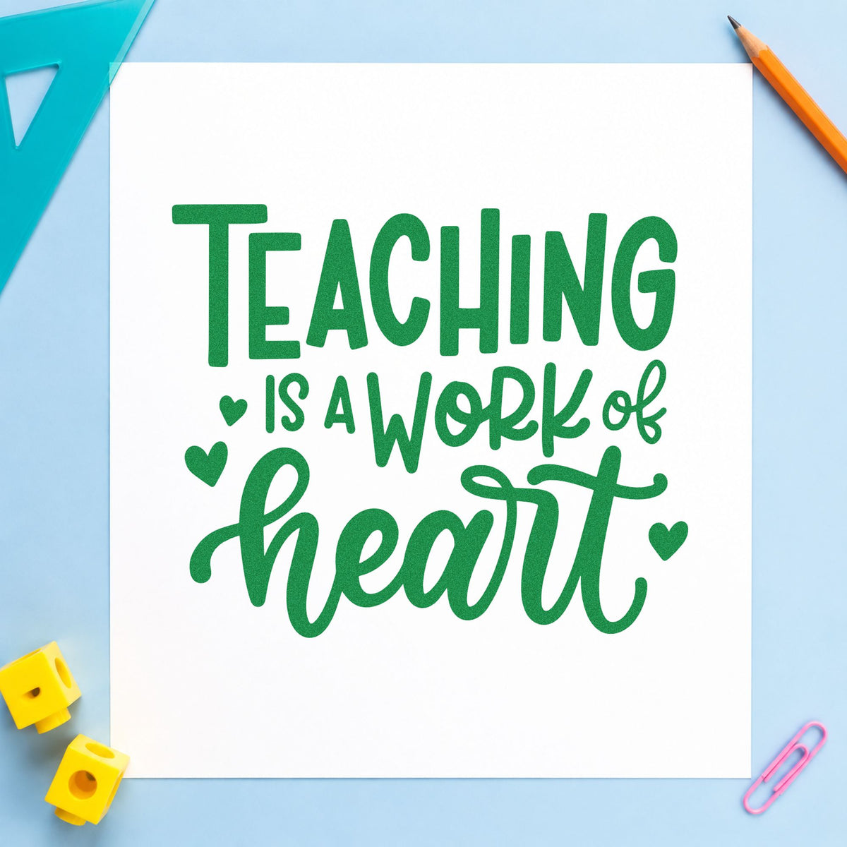 Teaching Work of Heart craft stamp imprint in green ink on a handmade project, one idea being pen pal pages.