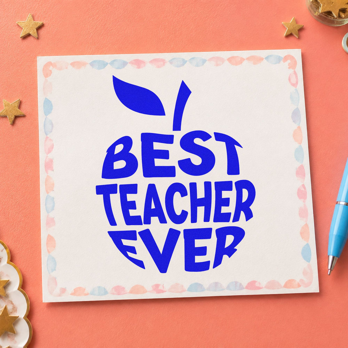 Best Teacher Ever Apple craft stamp in blue ink on cardstock, an easy option for felt applique panels.