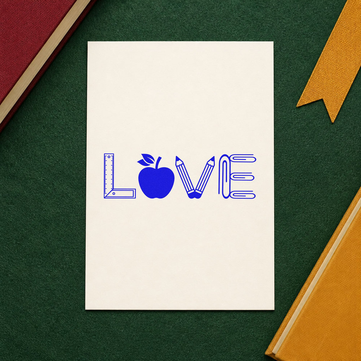 Love School Supplies craft stamp in blue ink on cardstock, an easy option for tool roll panels.