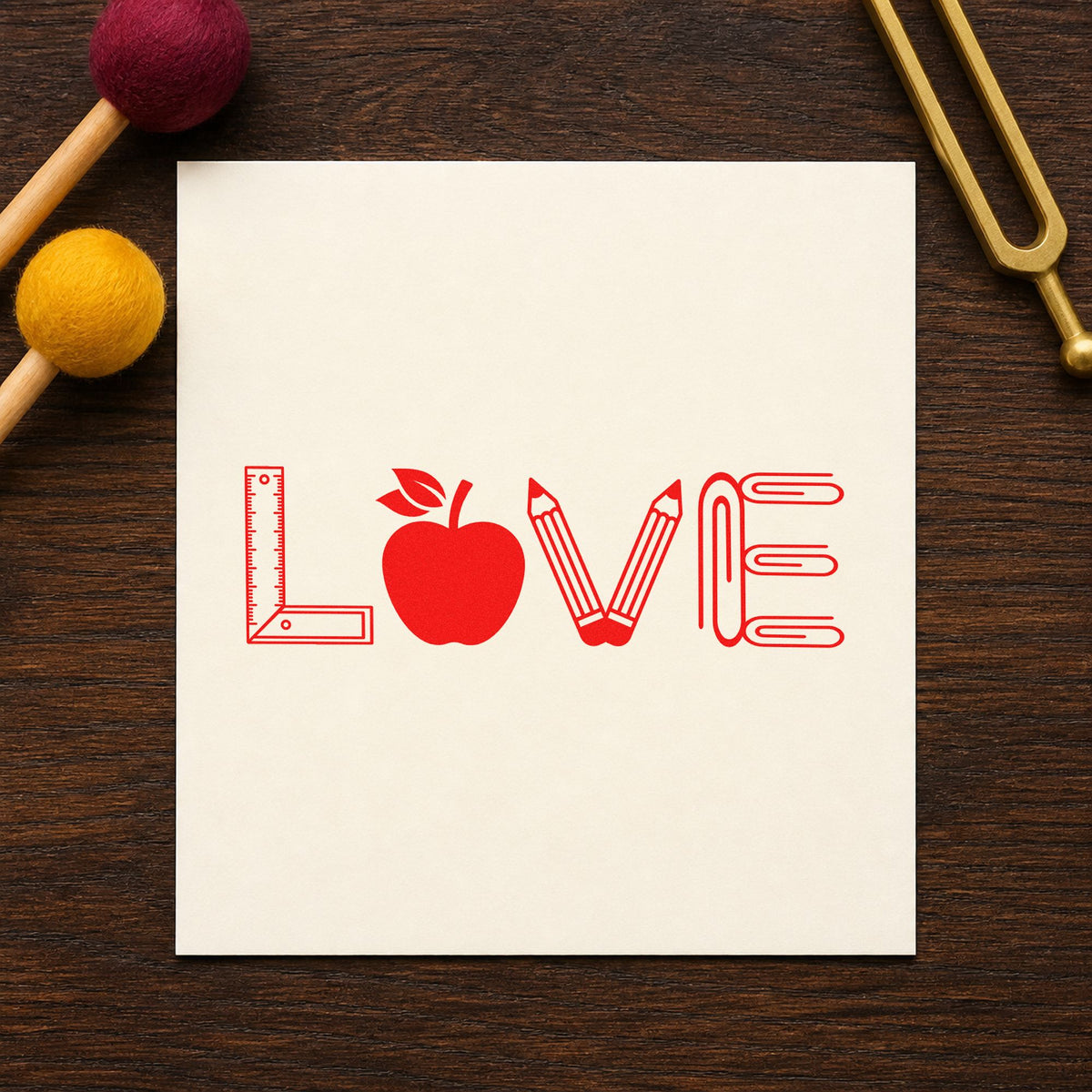 Love School Supplies rubber stamp shown in red ink, stamped for projects such as donation drive notes.