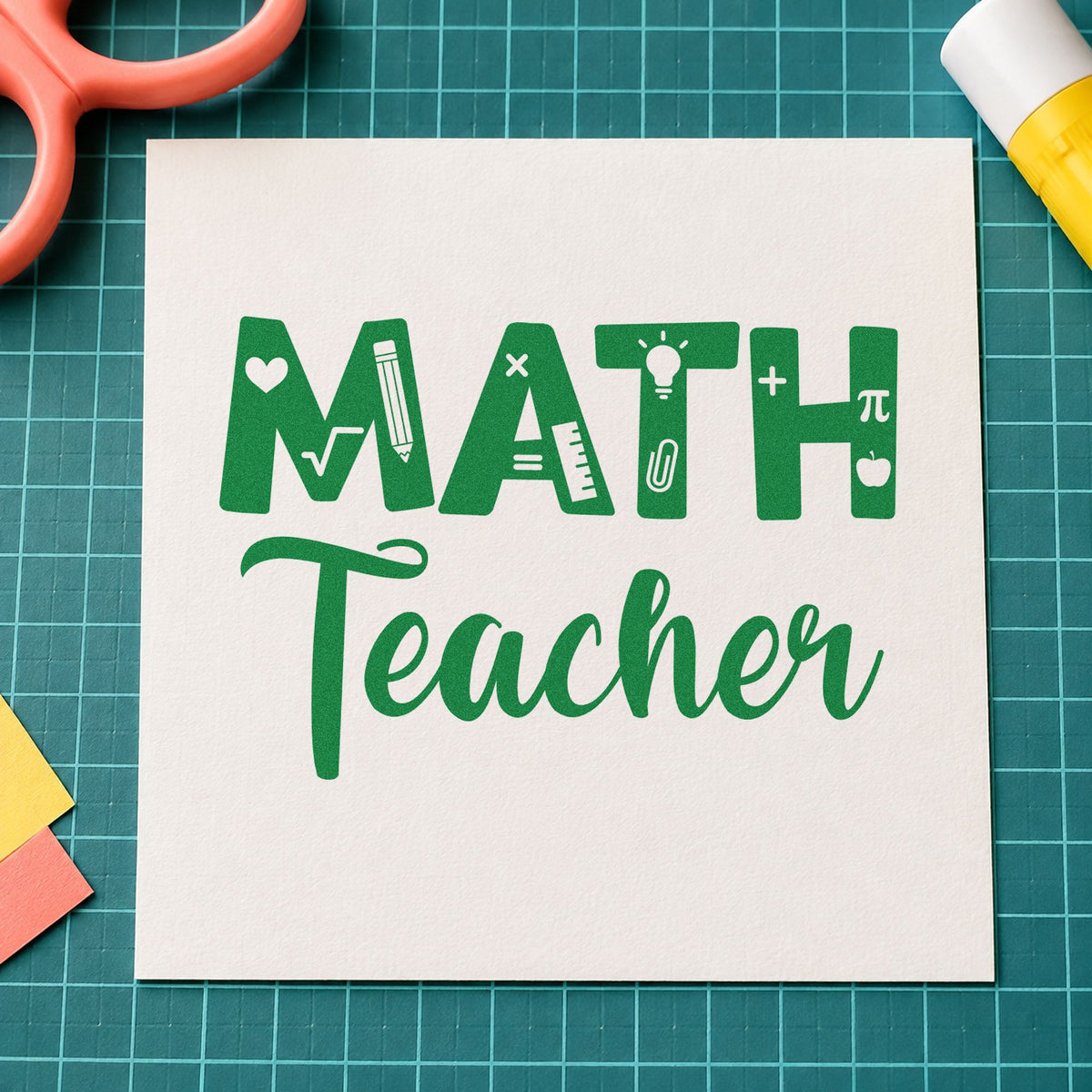 Math Teacher craft stamp imprint in green ink on a handmade project, one idea being graph paper pages.