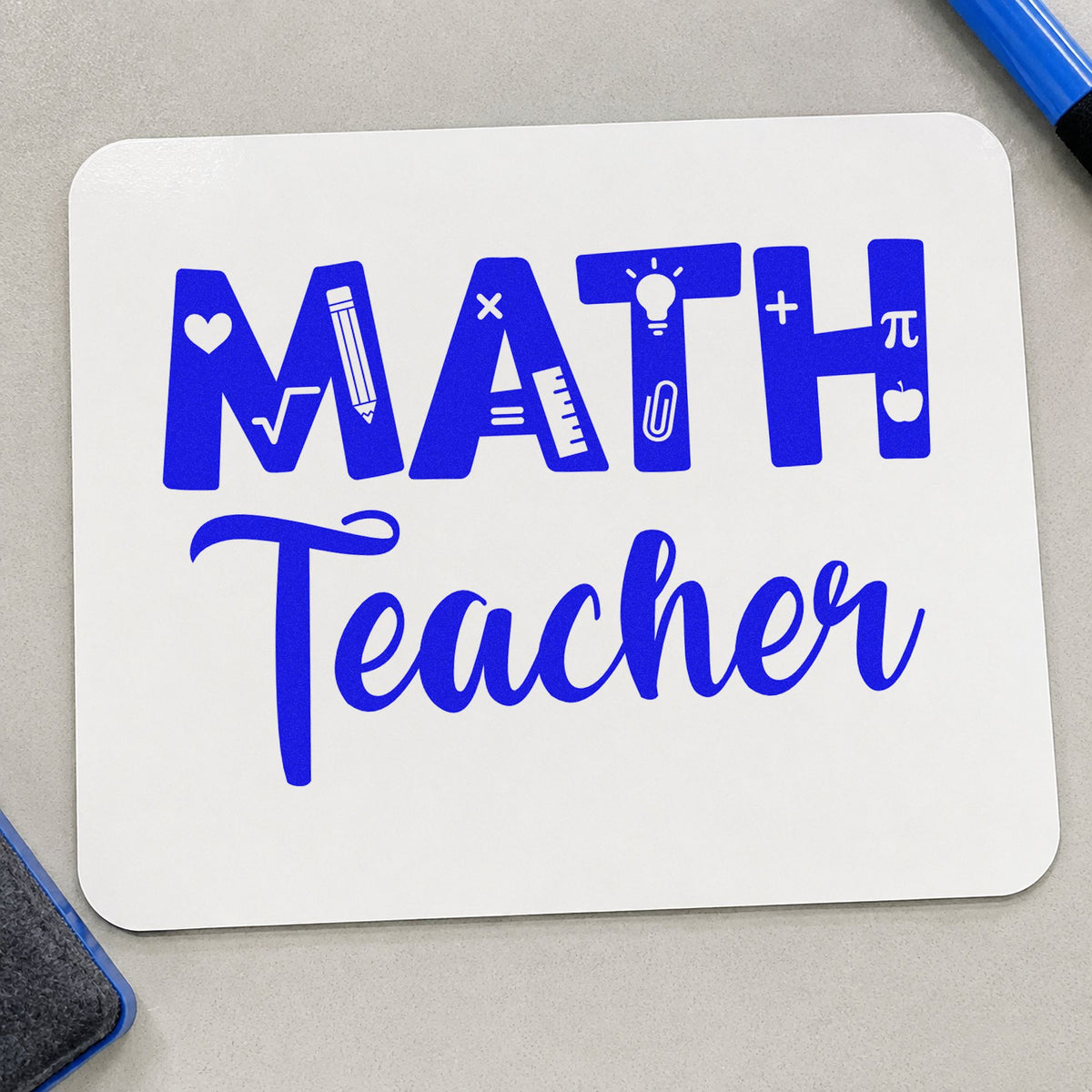 Math Teacher craft stamp in blue ink on cardstock, an easy option for calculator case panels.
