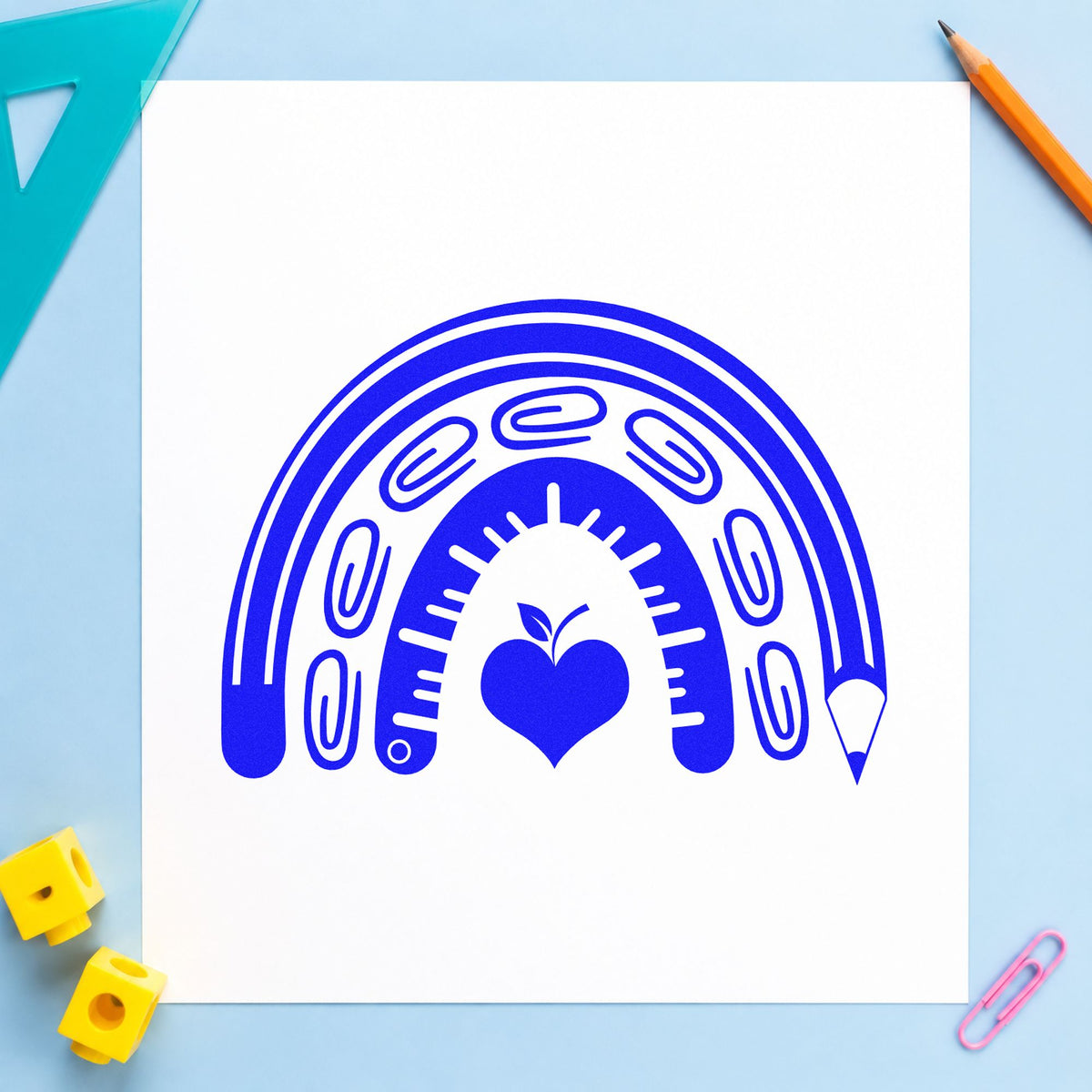 School Supply Rainbow craft stamp imprinted in blue ink on paper, a design suited to locker magnet seals.