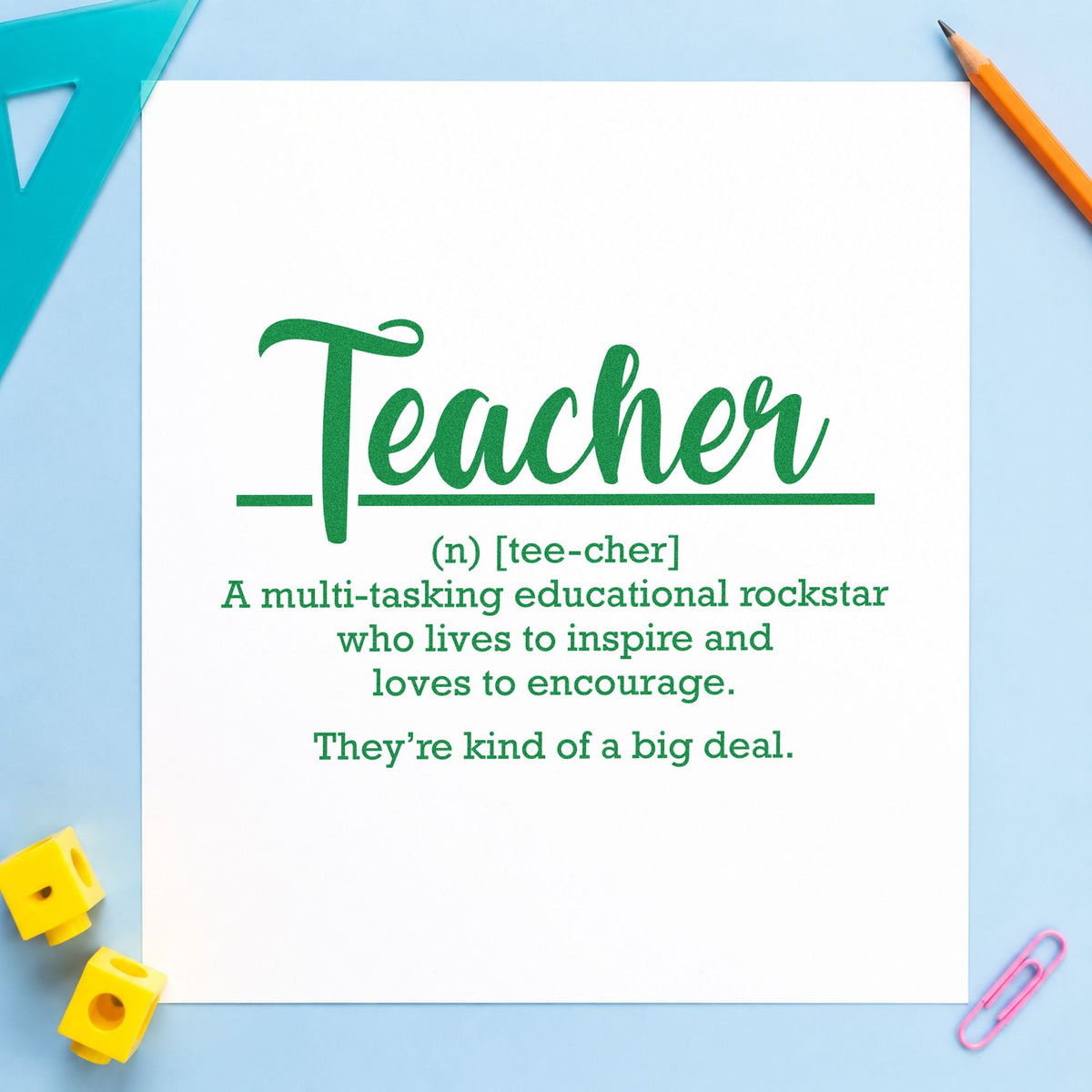 Teacher Definition craft stamp imprint in green ink on a handmade project, one idea being glossary sheet pages.