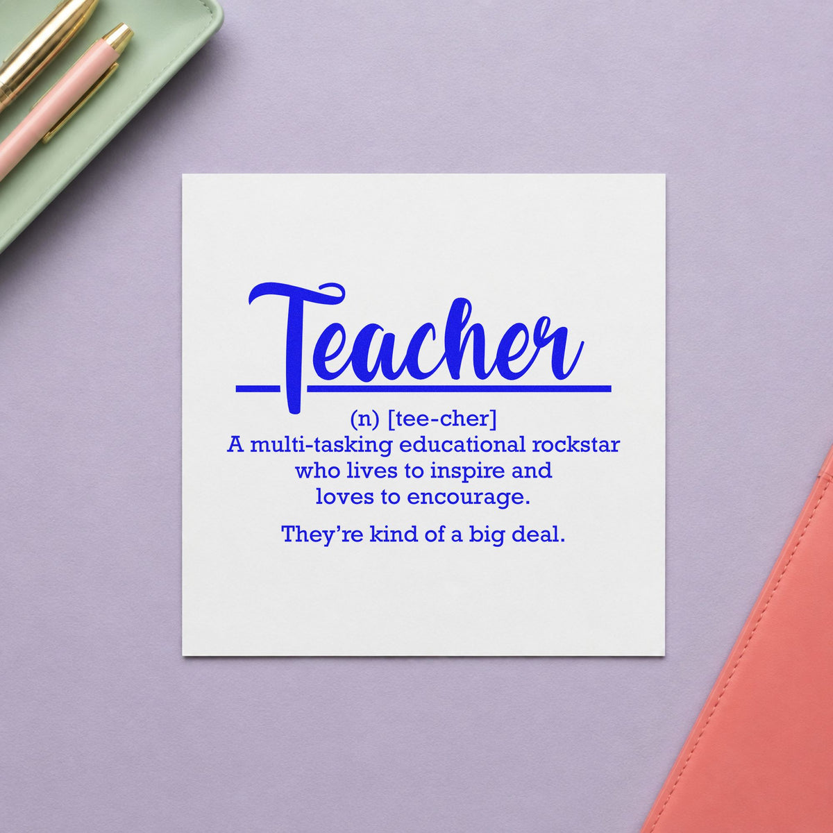 Teacher Definition craft stamp in blue ink on cardstock, an easy option for book sleeve panels.