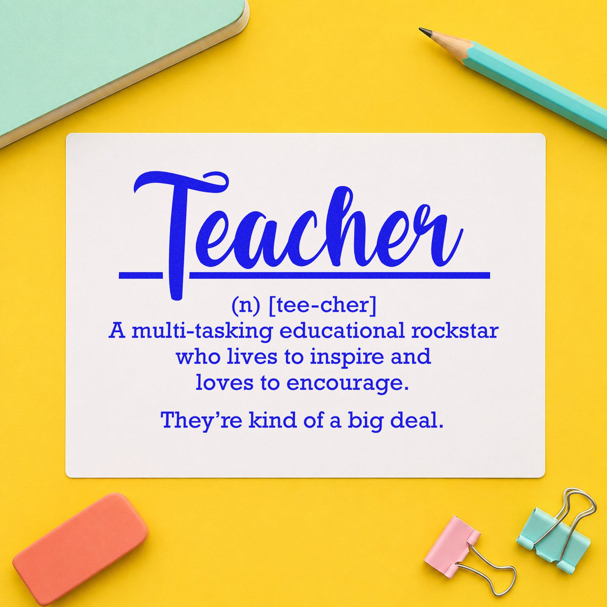Teacher Definition craft stamp imprinted in blue ink on paper, a design suited to word wall seals.