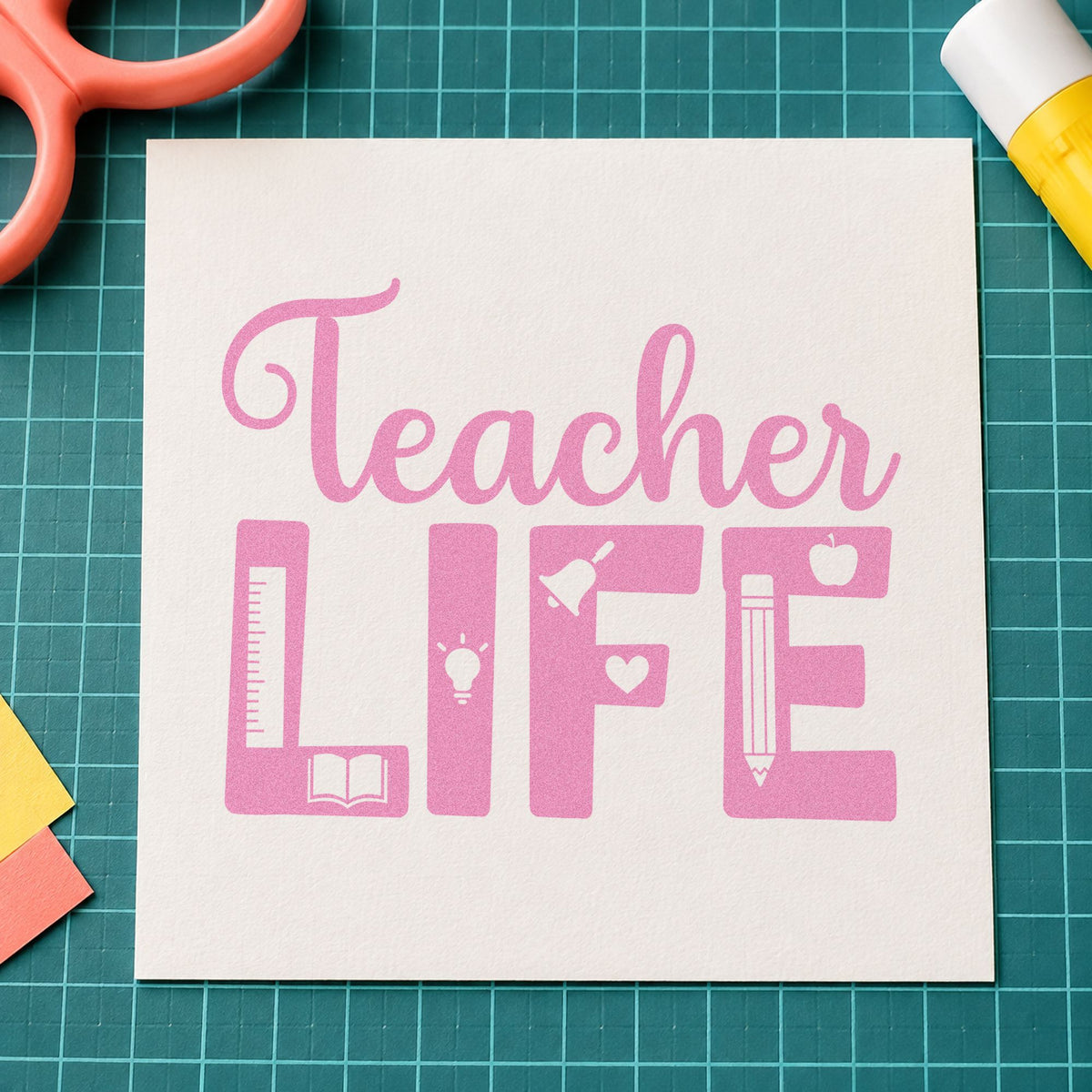 Teacher Life Supplies craft stamp in purple ink on cardstock, an easy option for merch swing tags.