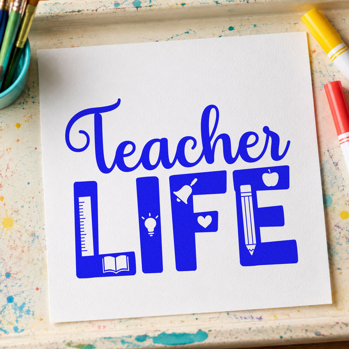 Teacher Life Supplies craft stamp in blue ink on cardstock, an easy option for hoodie chest panels.