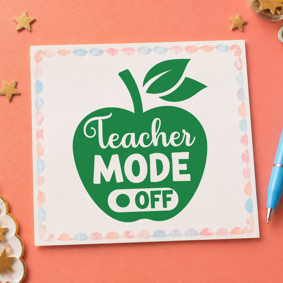 Teacher Mode Off Apple craft stamp imprint in green ink on a handmade project, one idea being framed hall switch.