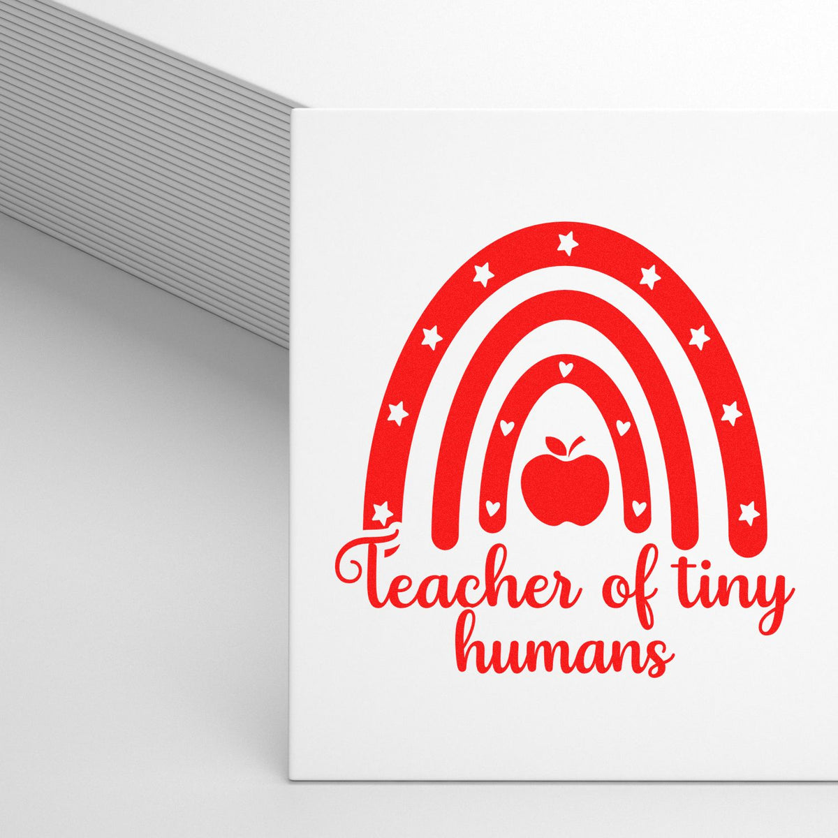 Red stamp and seal design with rainbow, apple, stars, and teacher of tiny humans on a white background.