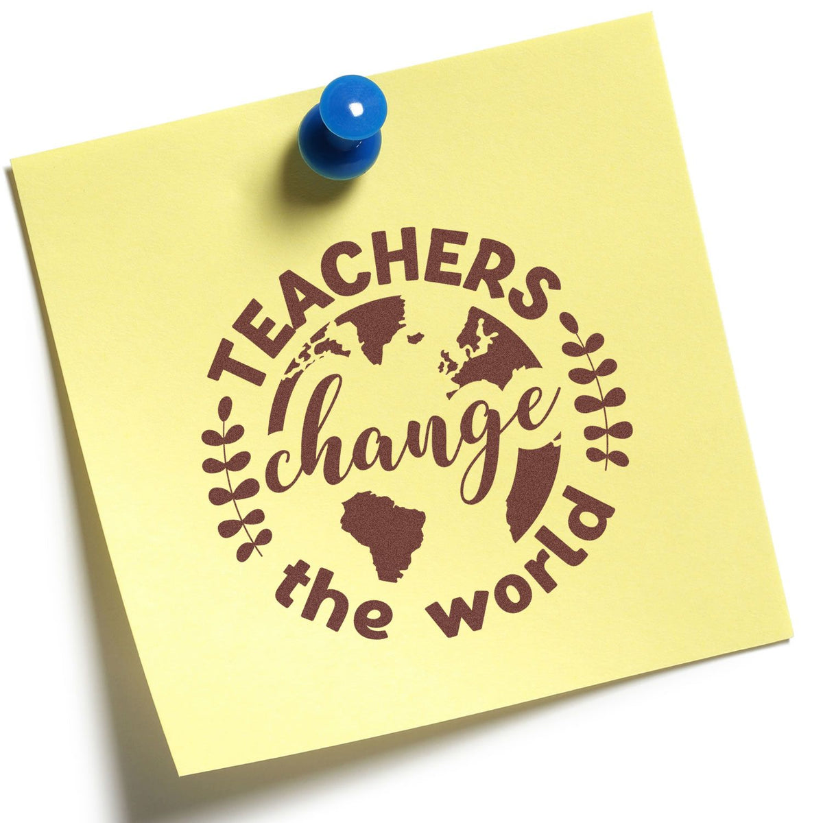 Yellow sticky note with blue pushpin and brown teacher stamp seal reading Teachers change the world with globe and leaves.