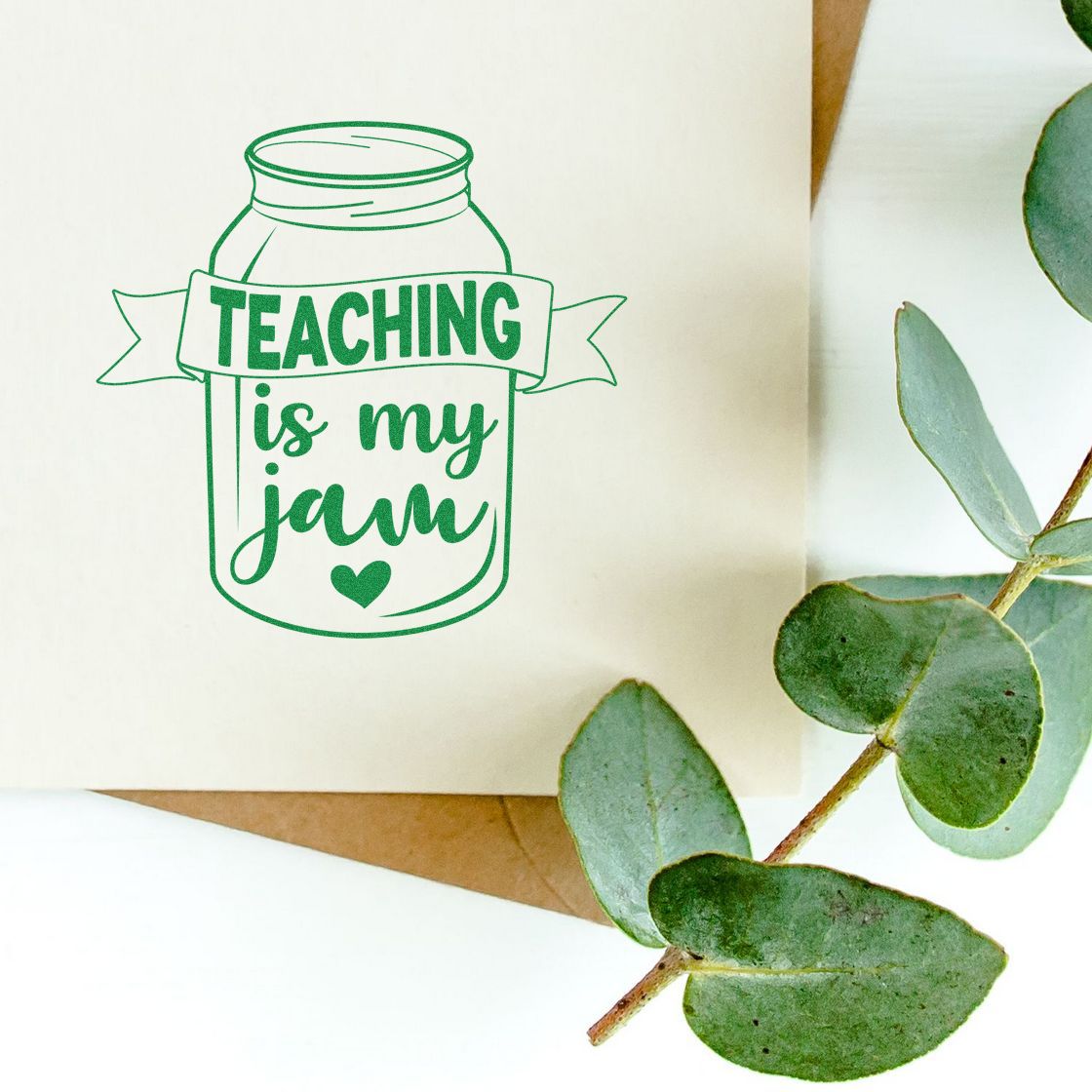 Green Teaching is my jam jar stamp seal with heart on cream paper, accented by eucalyptus leaves