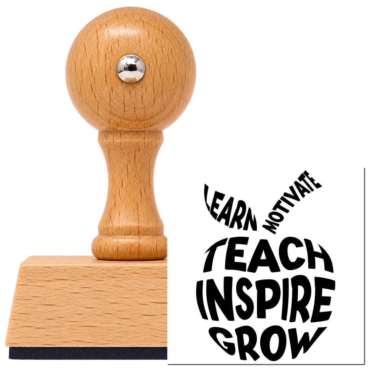 Vintage Pro beech wood stamp with a round knob handle, shown with its black Teach Inspire Grow Apple Lettering imprint on white.