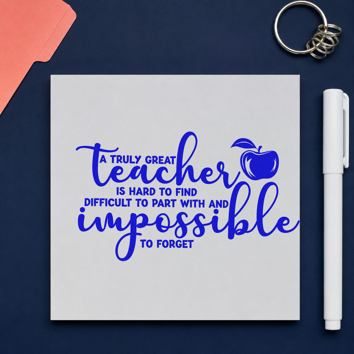 Truly Great Teacher Apple craft stamp in blue ink on cardstock, an easy option for scarf corner panels.
