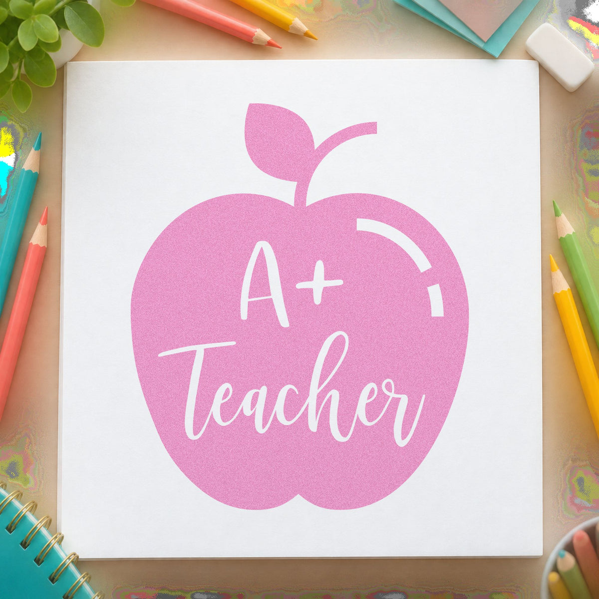 A Plus Teacher Solid Apple craft stamp in purple ink on cardstock, an easy option for top grade tags.