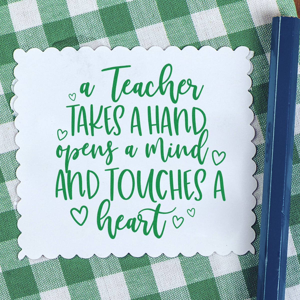 Green teacher stamp seal on white scalloped card over green gingham, with hearts and inspirational quote.