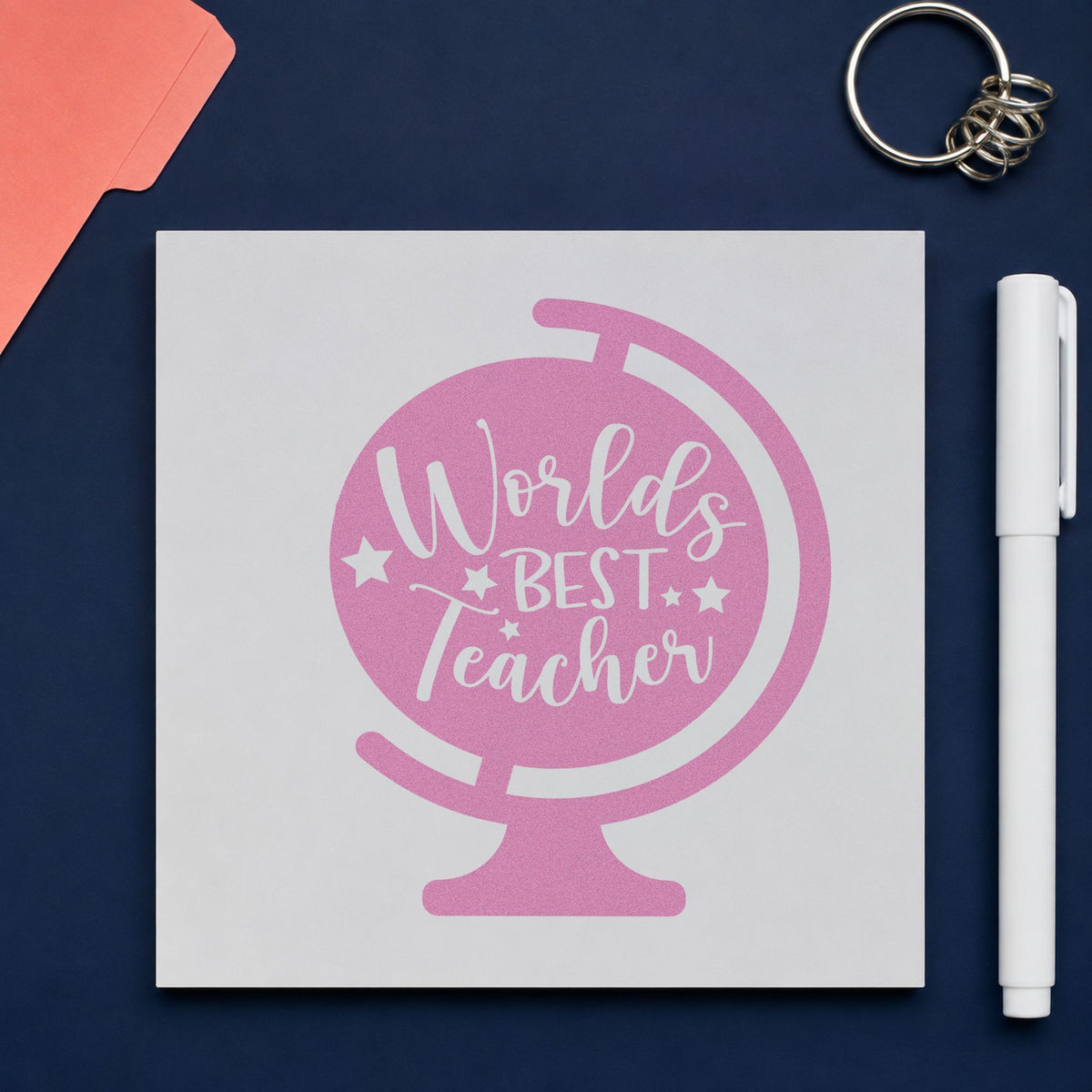 World's Best Teacher Tilted Globe craft stamp in purple ink on cardstock, an easy option for star award tags.