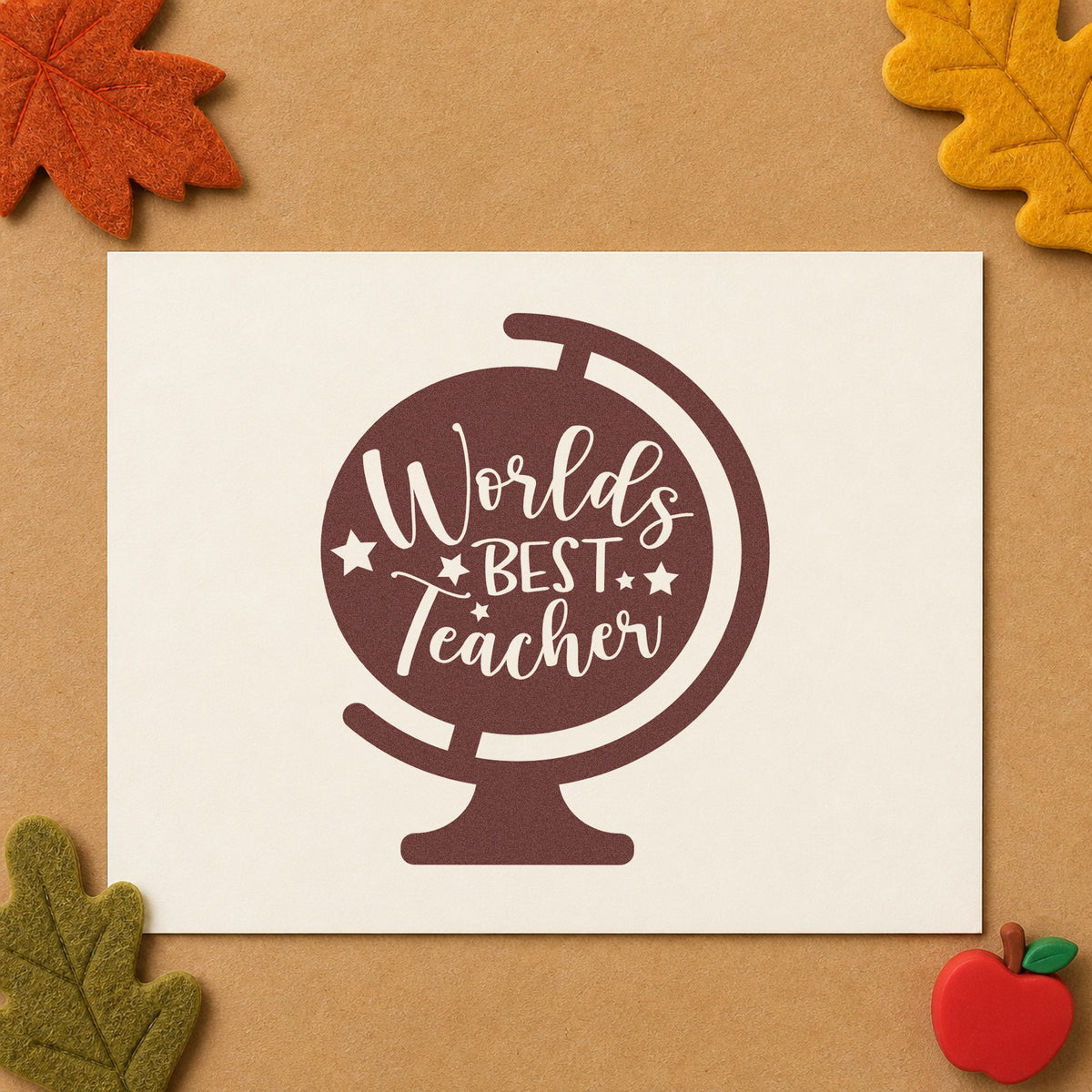 World's Best Teacher Tilted Globe rubber stamp printed in brown ink, ready for snow globe labels and similar paper crafts.
