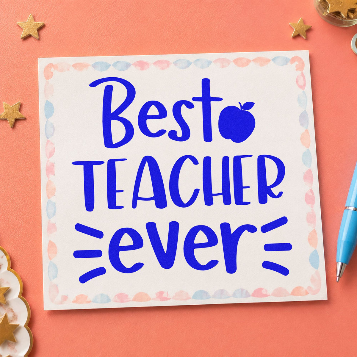 Best Teacher Ever craft stamp imprinted in blue ink on paper, a design suited to kraft flap seals.