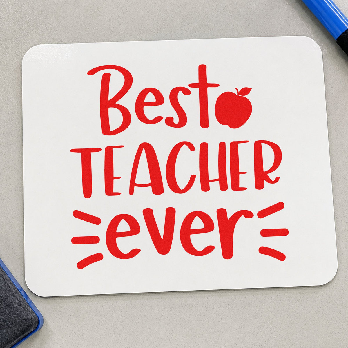 Best Teacher Ever rubber stamp shown in red ink, stamped for projects such as last lesson notes.