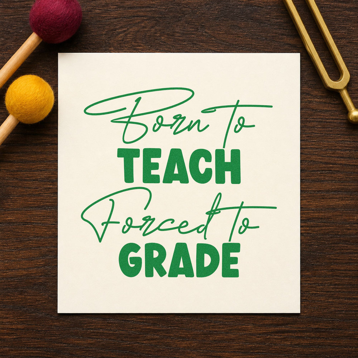 Born to Teach Forced to Grade craft stamp imprint in green ink on a handmade project, one idea being framed marking desk.