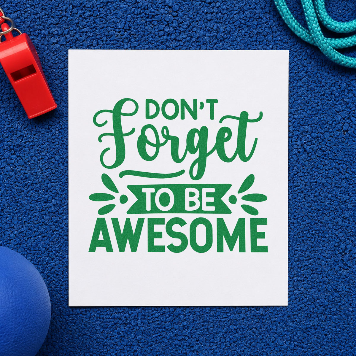 Don't Forget To Be Awesome craft stamp imprint in green ink on a handmade project, one idea being affirmation pages.