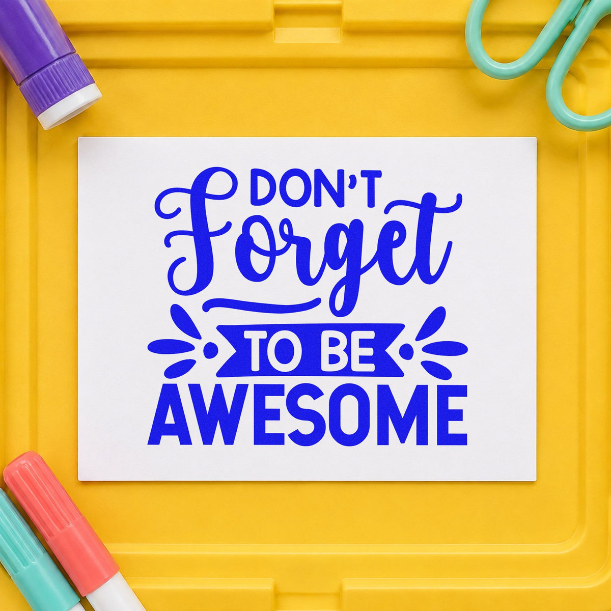 Don't Forget To Be Awesome craft stamp imprinted in blue ink on paper, a design suited to lunch bag seals.