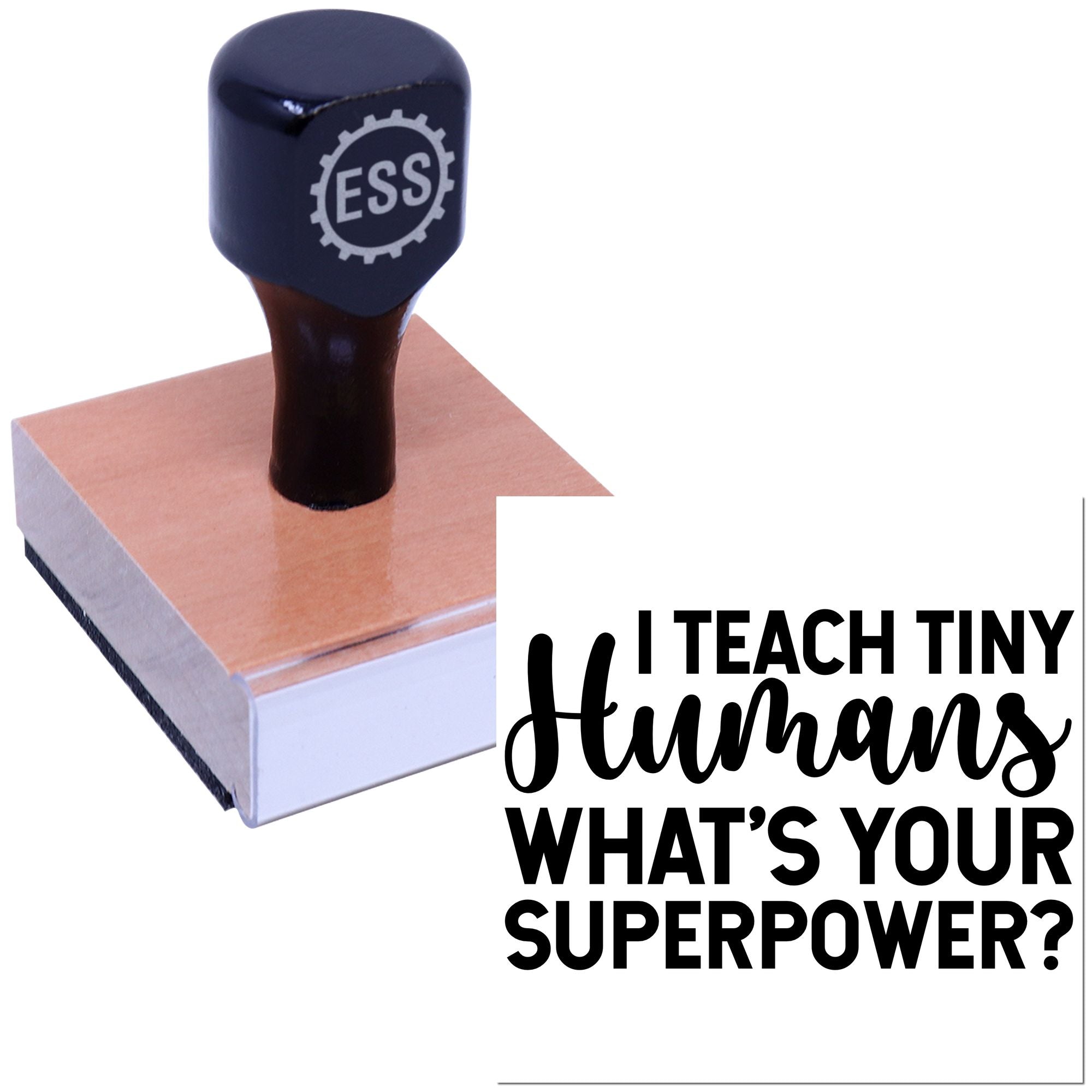 Black ESS custom stamp and seal on a pink wood block with white-and-black I Teach Tiny Humans Whats Your Superpower? text.
