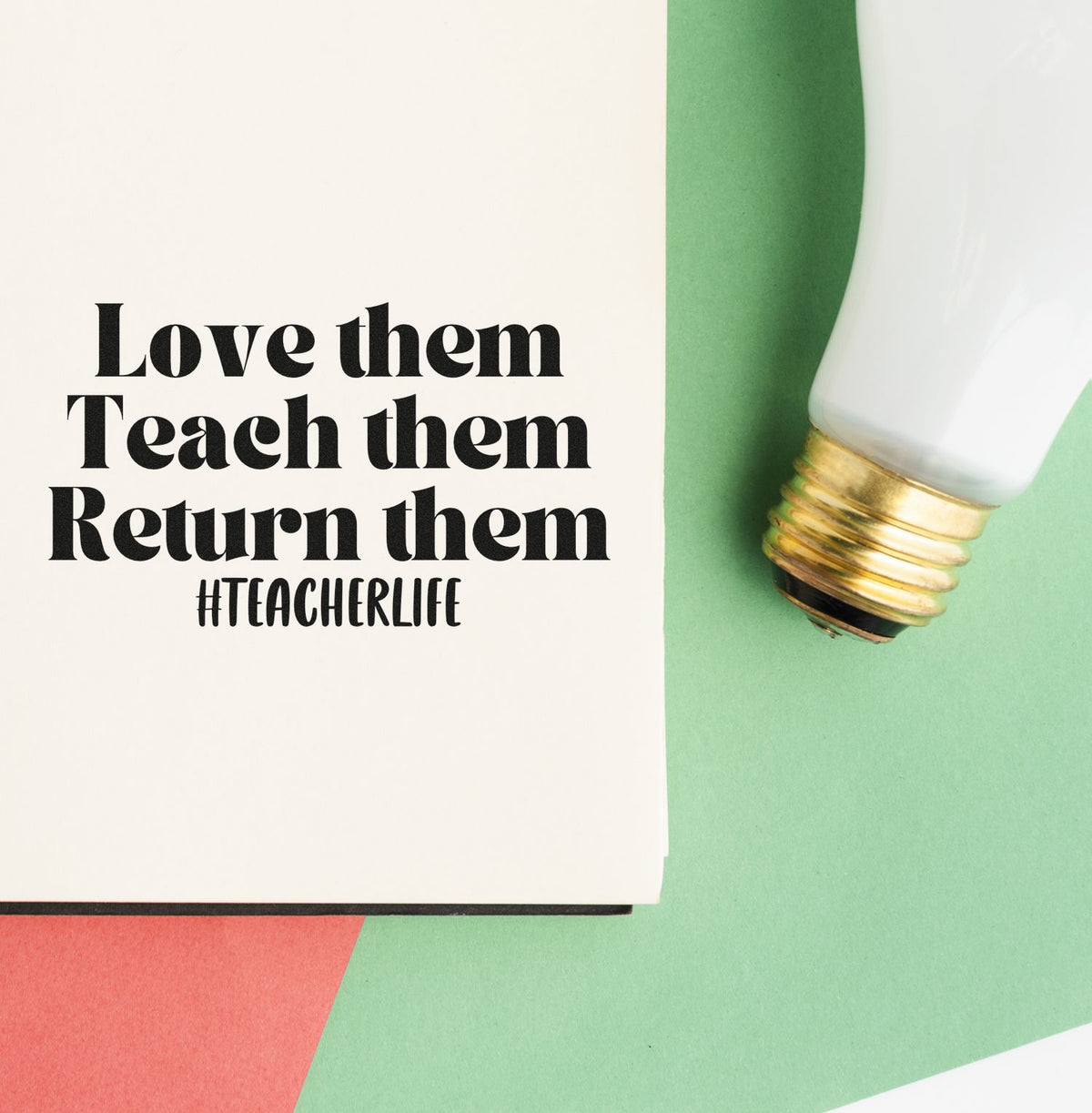 White teacher-life stamp and seal product with gold cap on green background beside cream card with black quote text.