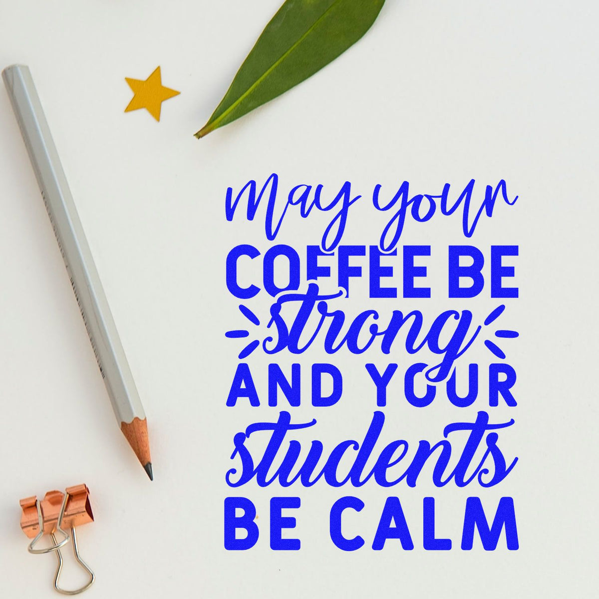 Blue stamp and seal design reading May your coffee be strong and your students be calm with pencil, leaf, and star.