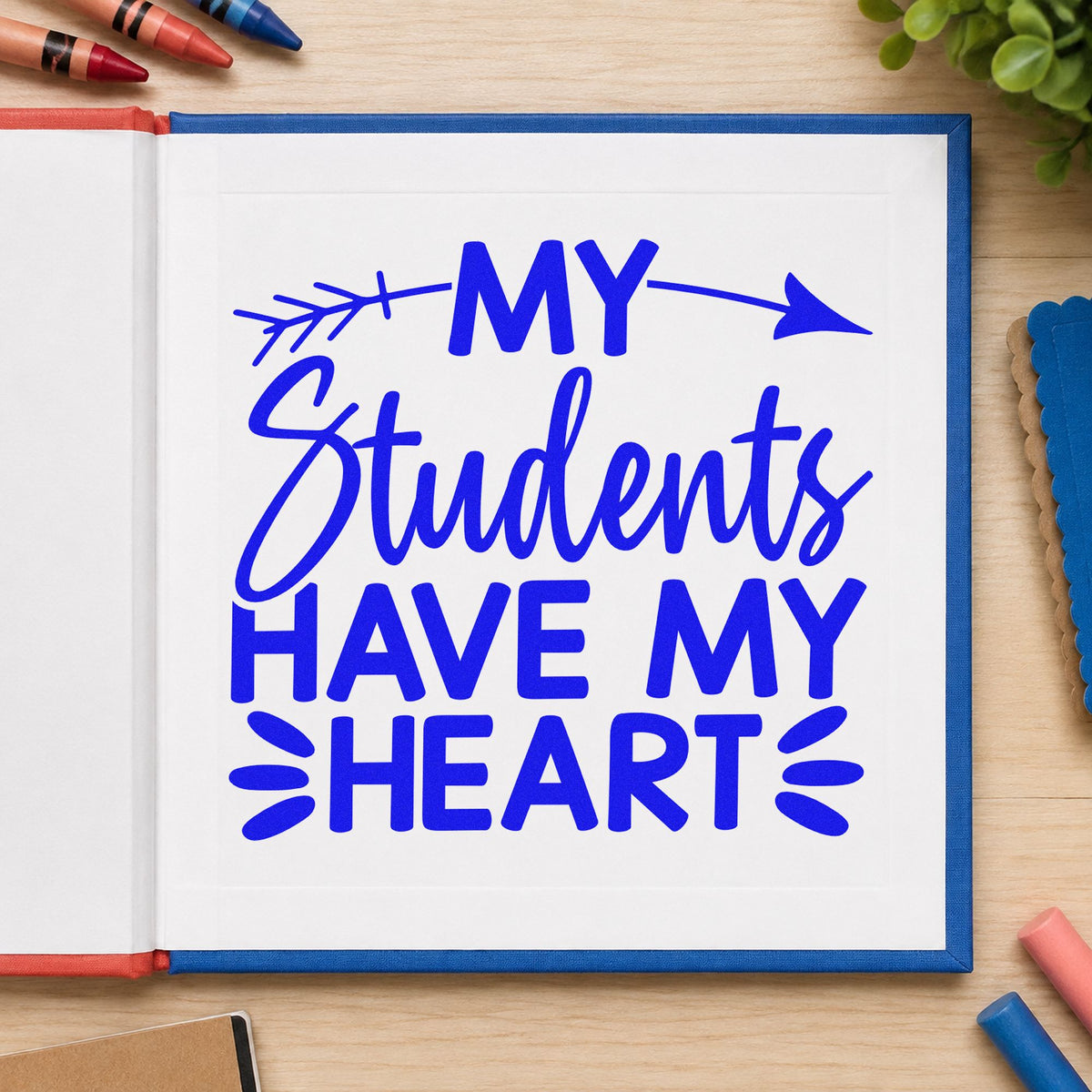 Students Have My Heart craft stamp imprinted in blue ink on paper, a design suited to autograph book seals.