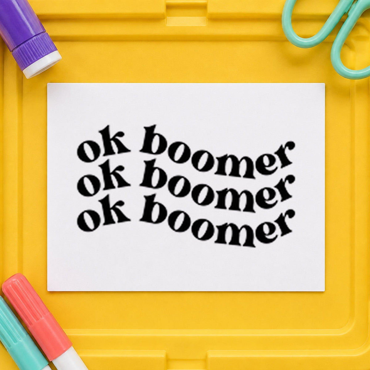 Repeated Wavy Ok Boomer rubber stamp printed in black ink, ready for curved rows cards and similar paper crafts.