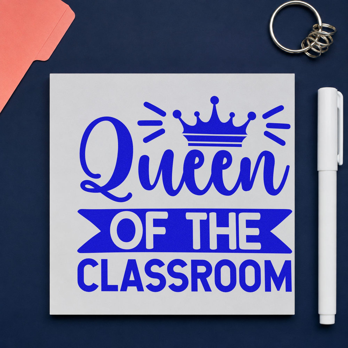 Queen Of The Classroom craft stamp in blue ink on cardstock, an easy option for sash ribbon panels.