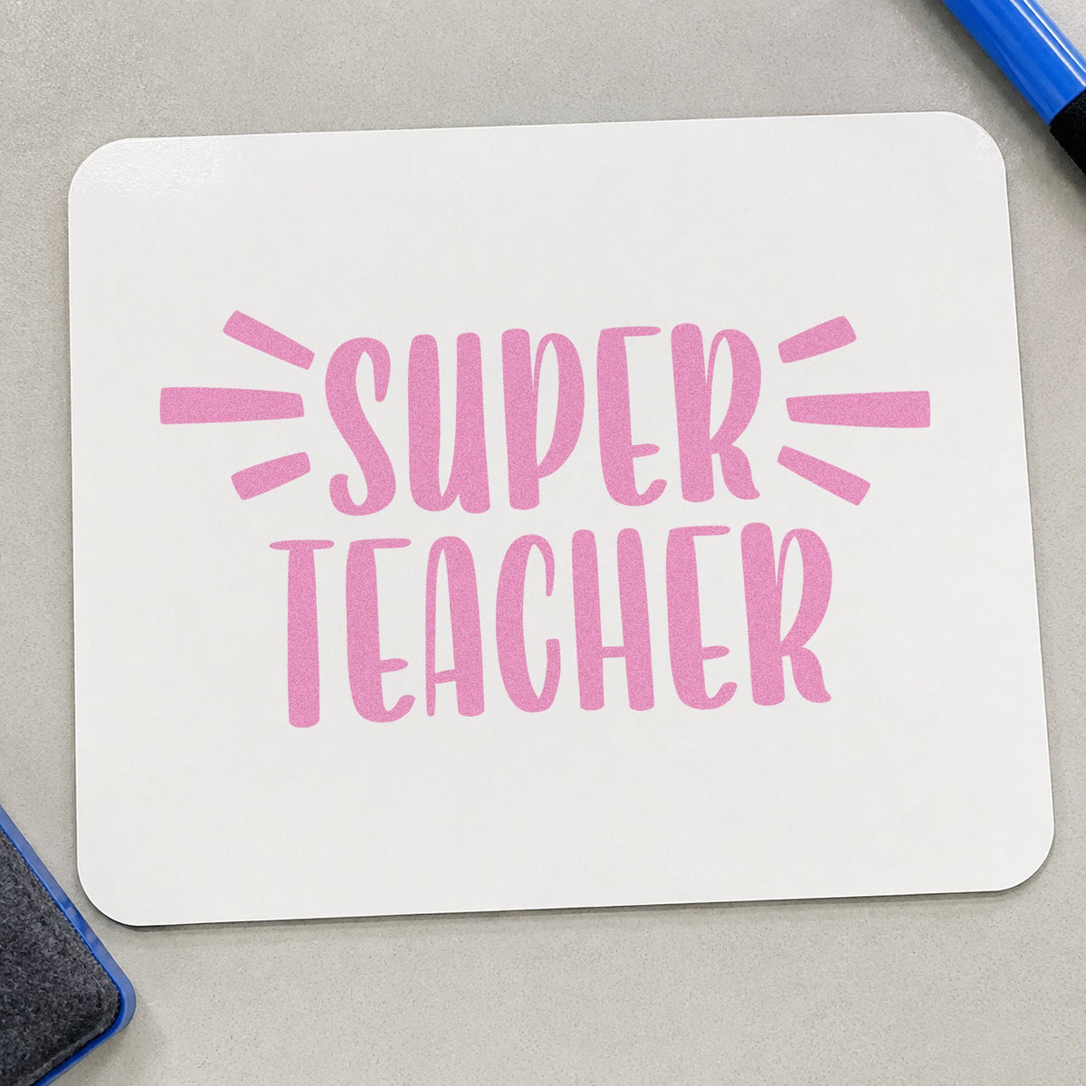 Super Teacher Bold Lettering craft stamp in purple ink on cardstock, an easy option for praise post tags.