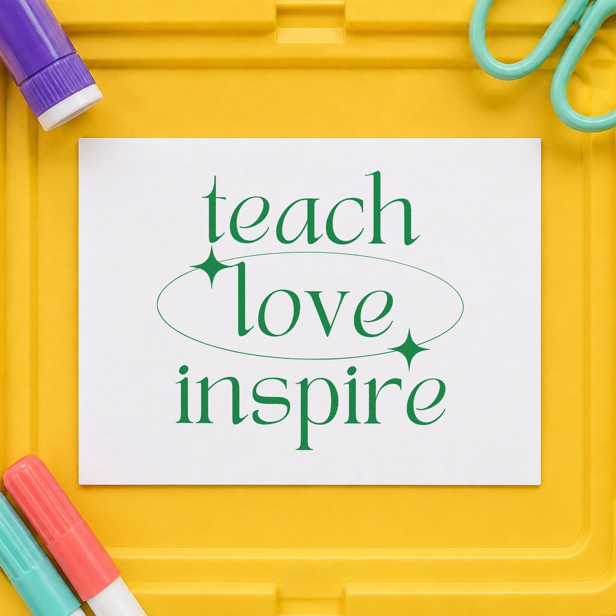 Teach Love Inspire Orbit craft stamp imprint in green ink on a handmade project, one idea being framed prep room.