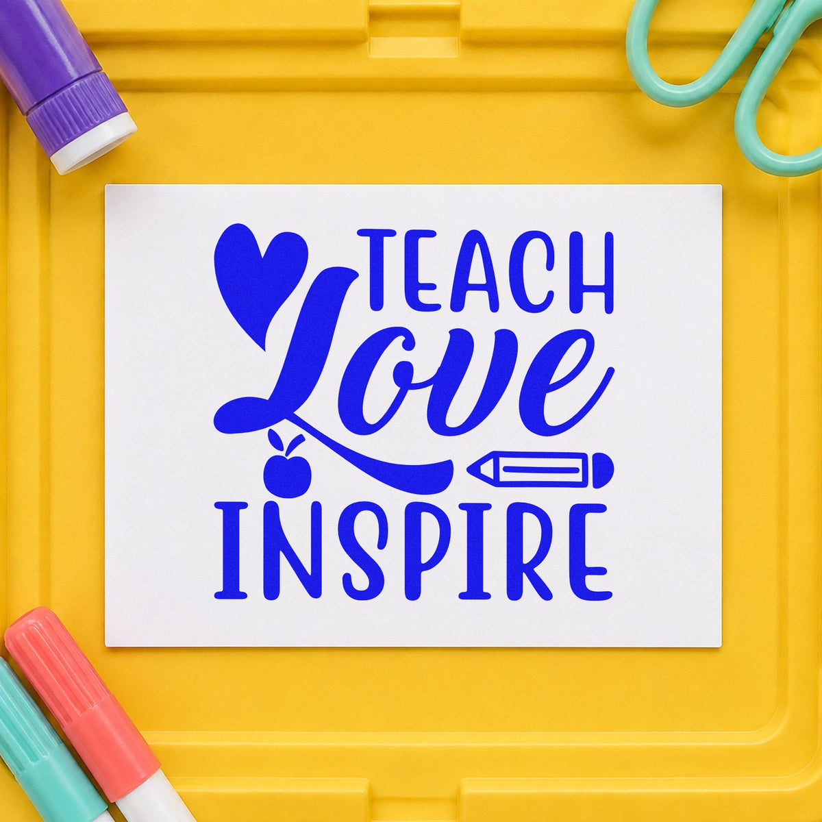 Teach Love Inspire Icons craft stamp in blue ink on cardstock, an easy option for apron bib panels.