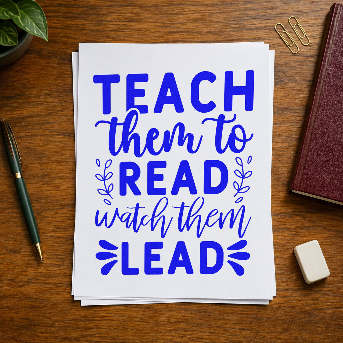 Teach Read Watch Lead craft stamp imprinted in blue ink on paper, a design suited to book plate seals.