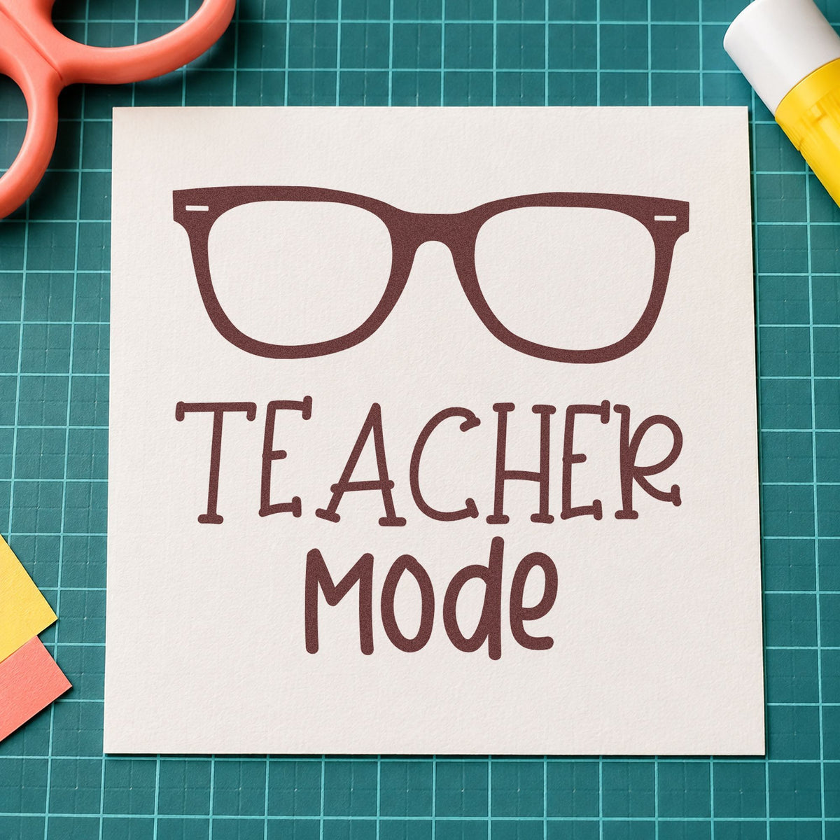 Teacher Mode Eyeglasses rubber stamp printed in brown ink, ready for lens cloth labels and similar paper crafts.