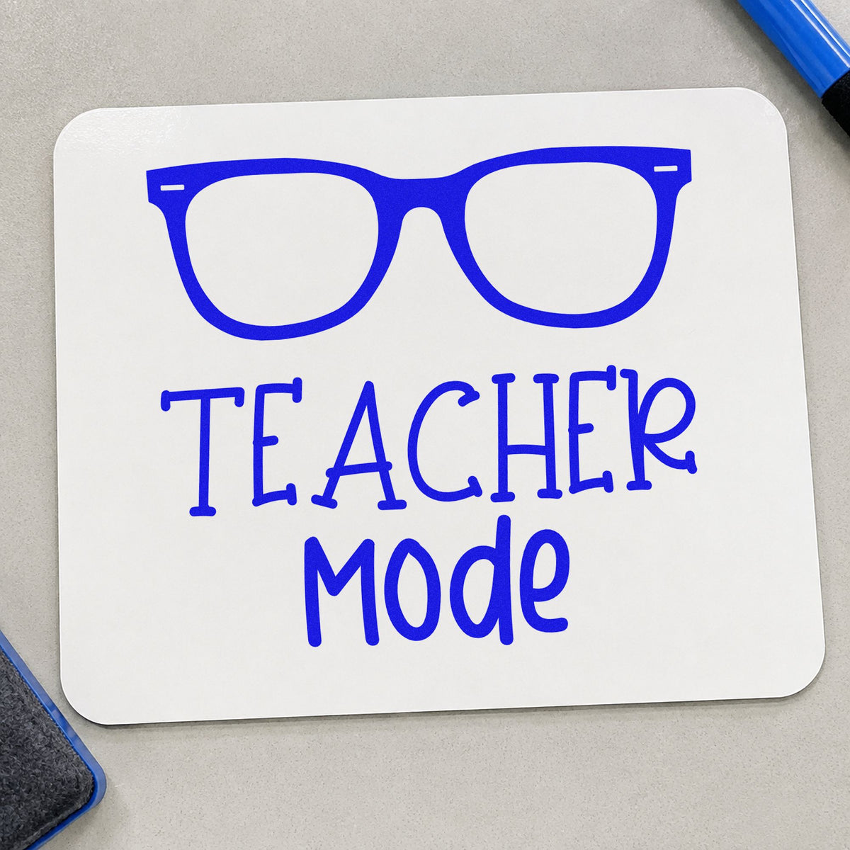 Teacher Mode Eyeglasses craft stamp imprinted in blue ink on paper, a design suited to screen break seals.
