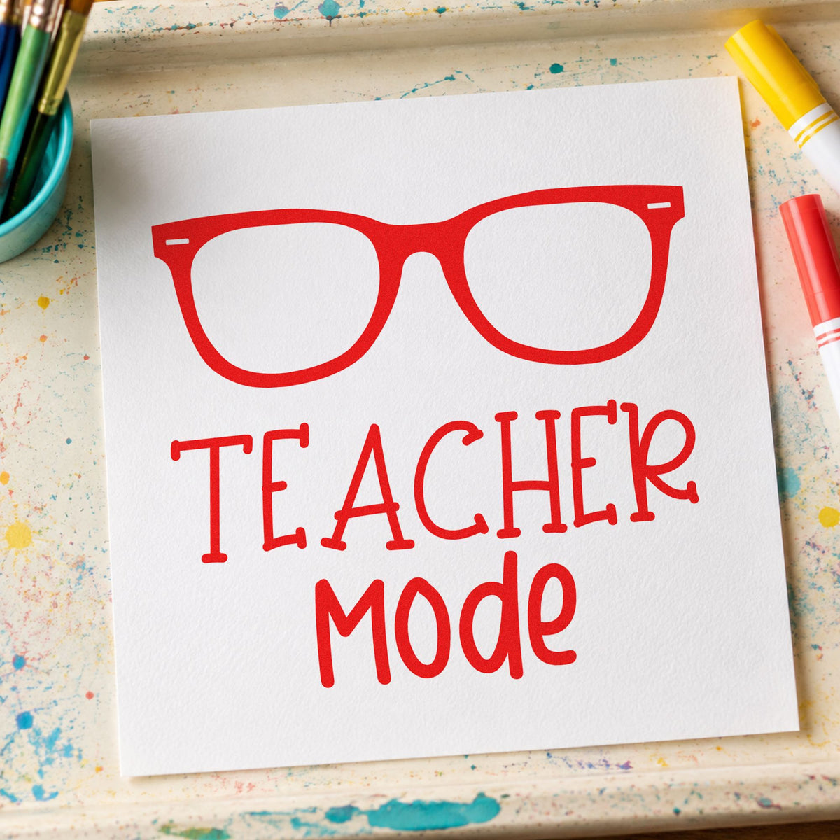 Teacher Mode Eyeglasses rubber stamp shown in red ink, stamped for projects such as marking night notes.