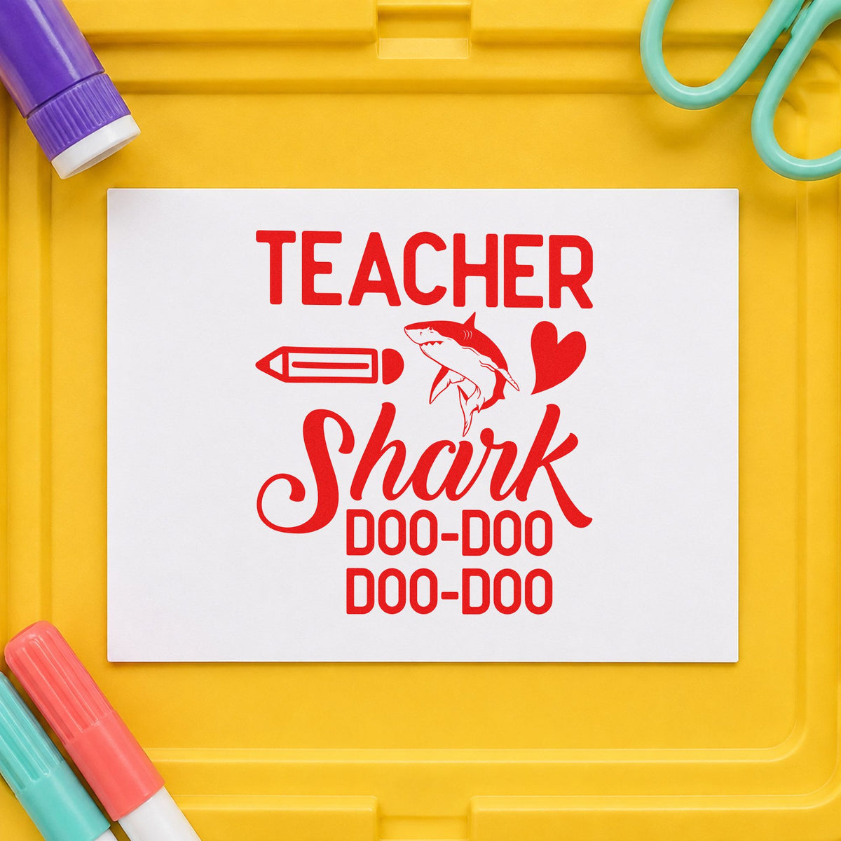Teacher Shark Doo Doo rubber stamp shown in red ink, stamped for projects such as sports day notes.