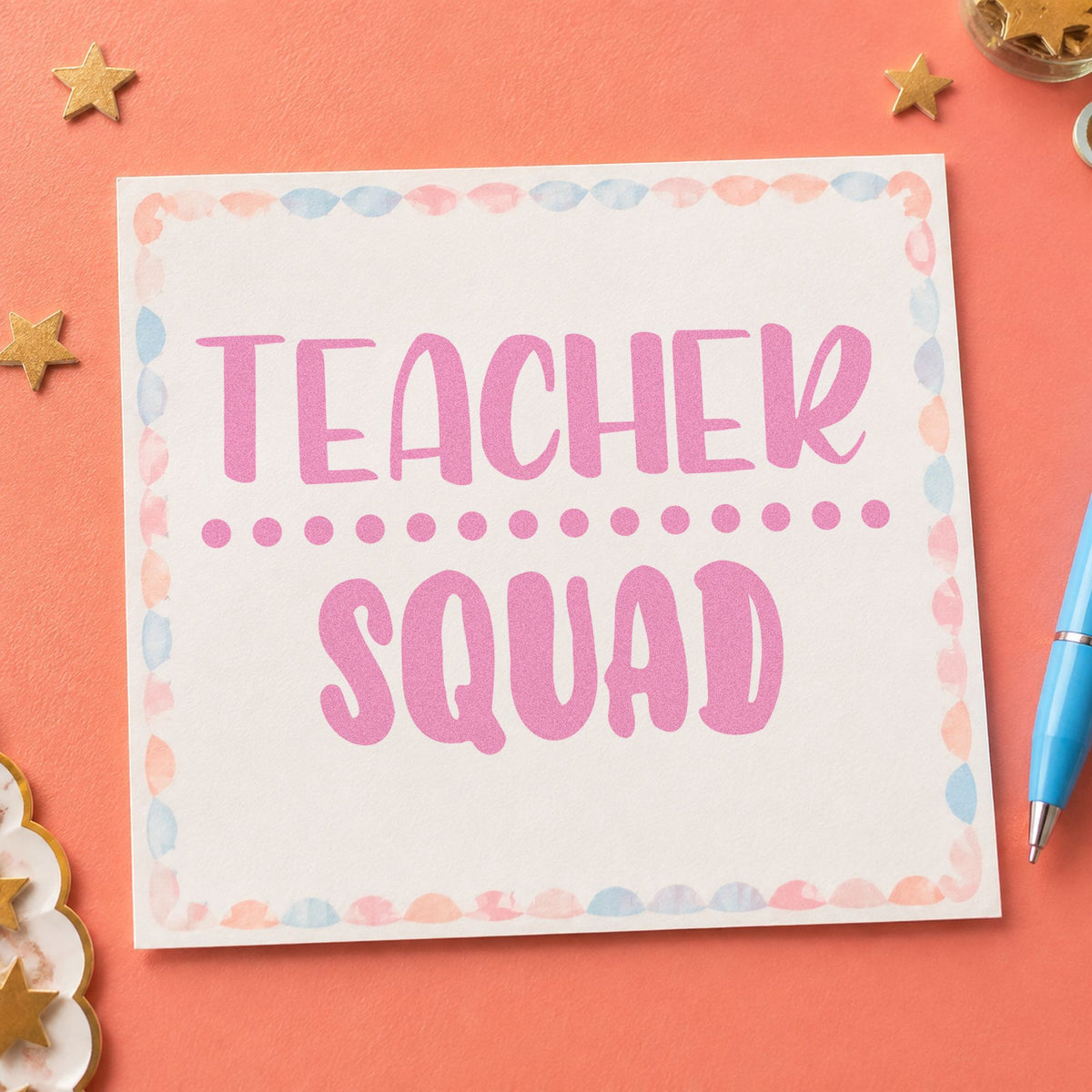Teacher Squad Dotted Divider craft stamp in purple ink on cardstock, an easy option for split shift tags.