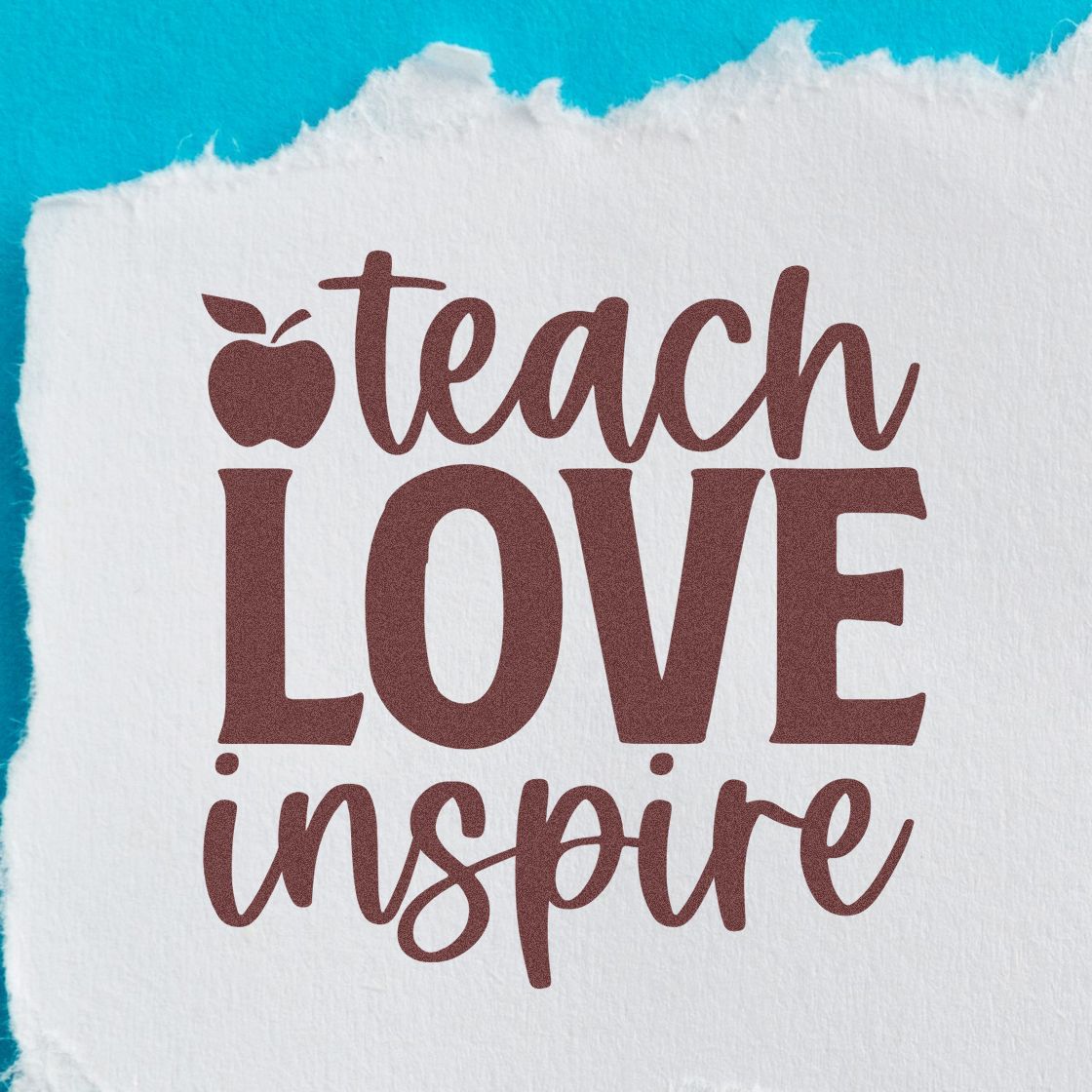 Burgundy vinyl stamp decal reading "teach LOVE inspire" with apple icon on torn white paper, turquoise background.