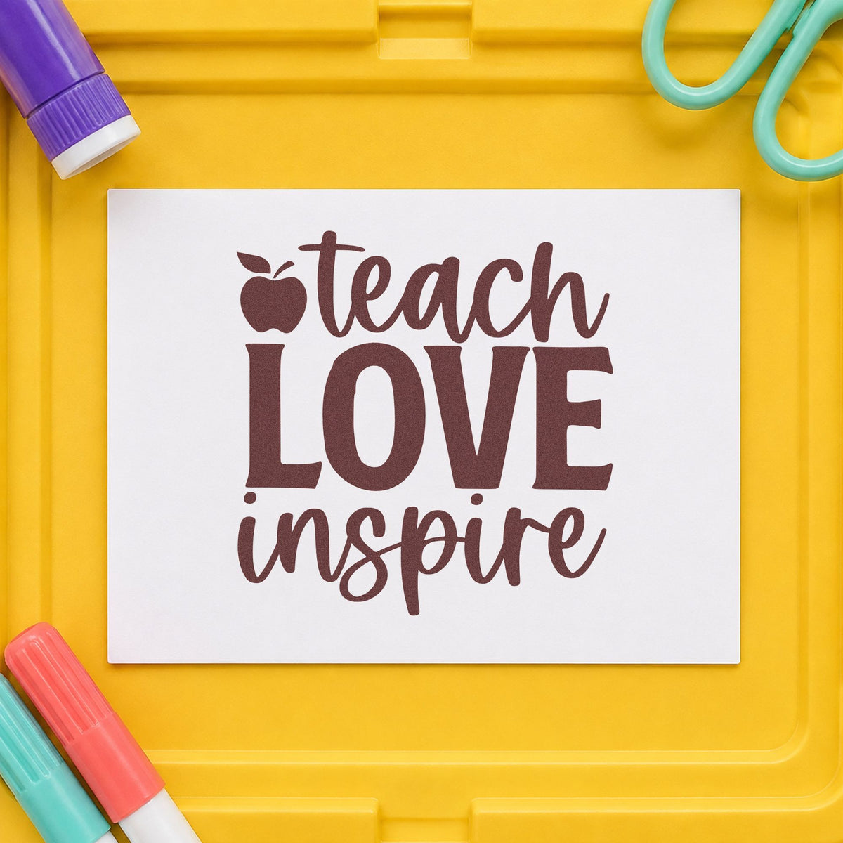 Teach Love Inspire Apple rubber stamp printed in brown ink, ready for favor jar labels and similar paper crafts.
