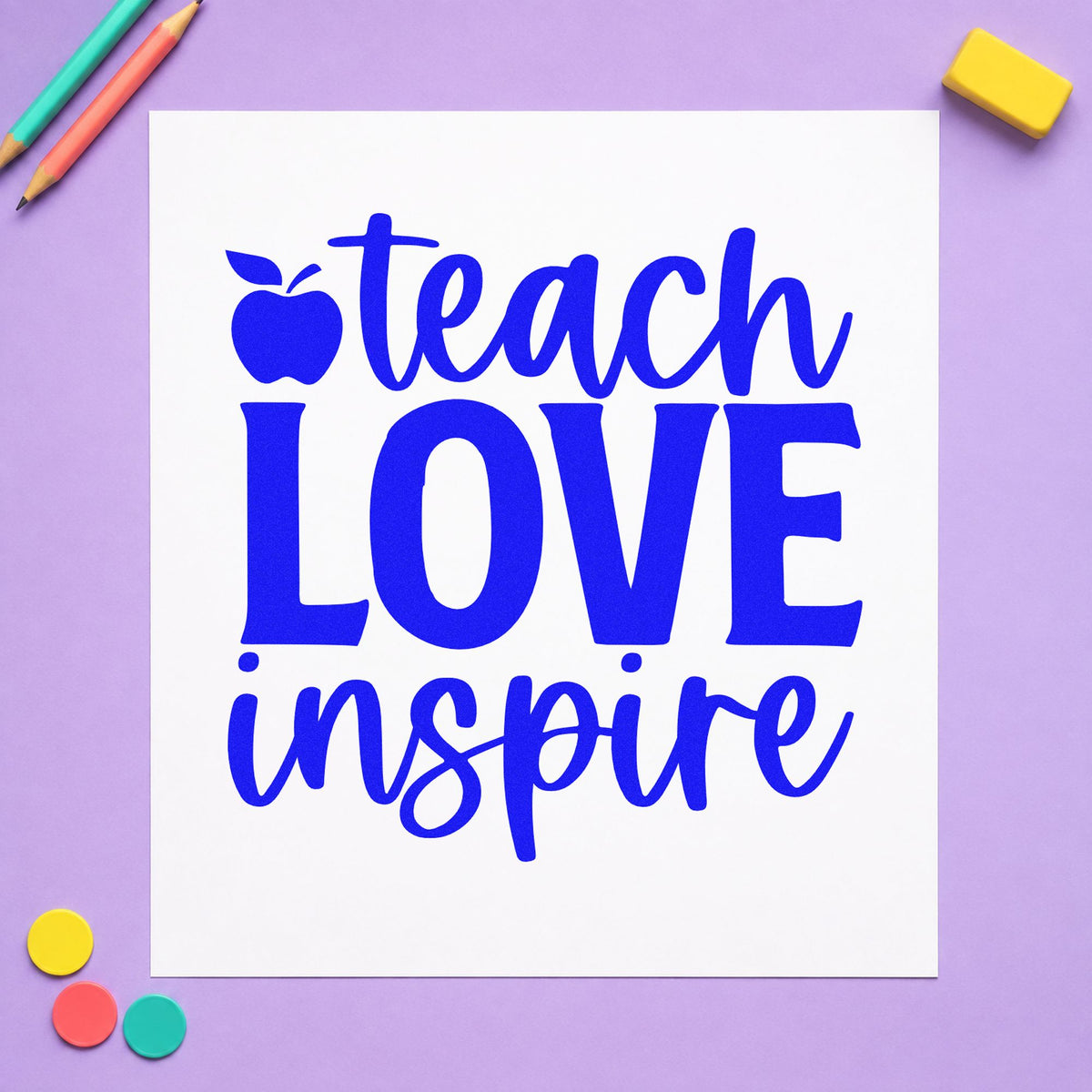 Teach Love Inspire Apple craft stamp imprinted in blue ink on paper, a design suited to invitation seals.