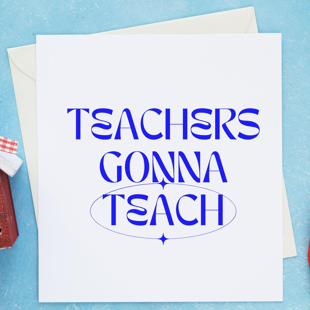 Blue Teachers Gonna Teach stamp and seal on white card, with bold decorative lettering and oval outline on a light blue background.