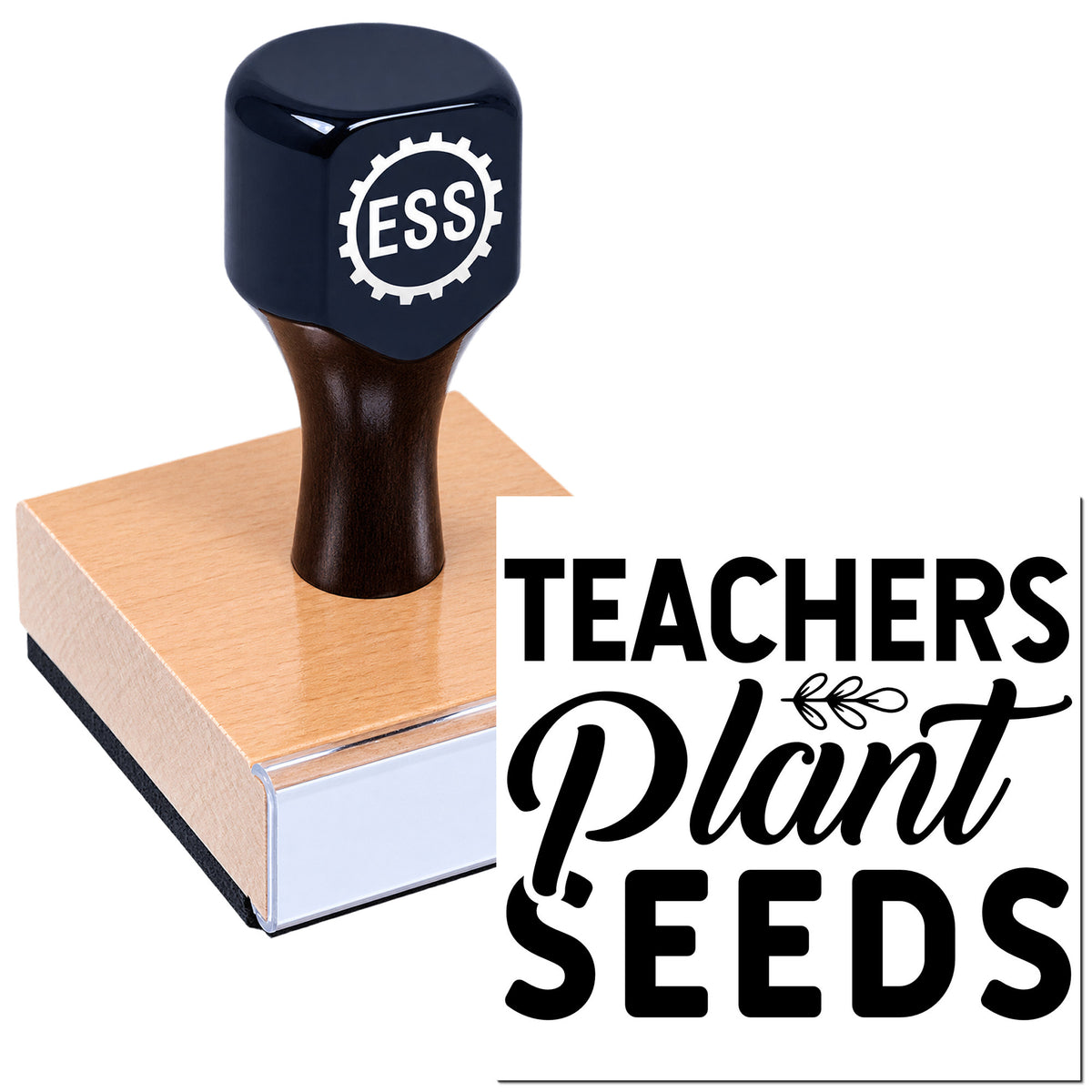 Black ESS rubber stamp on a brown wooden block with "Teachers Plant Seeds" seal design