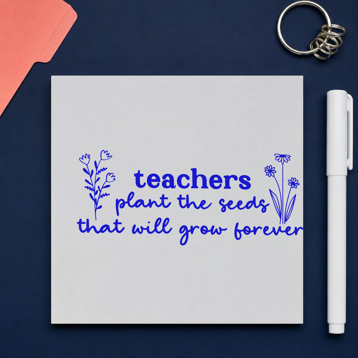 Teachers Plant Seeds Forever craft stamp in blue ink on cardstock, an easy option for apron hem panels.